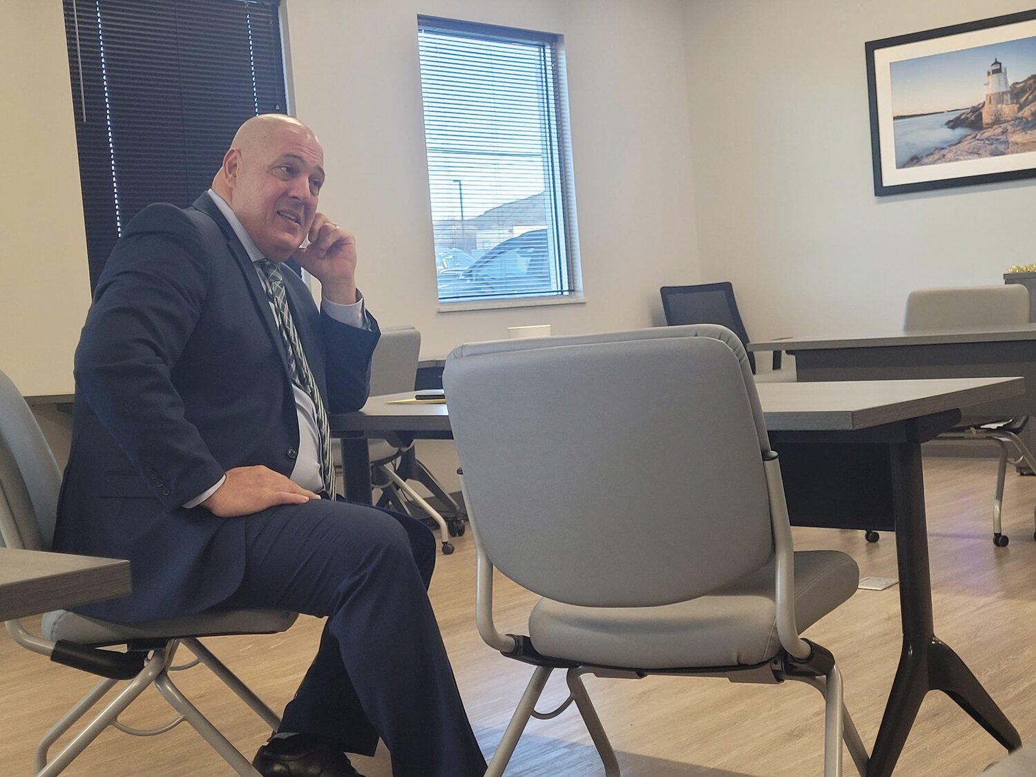 LAST DAY: To start his last day on the job, Rhode Island Resource Recovery Corporation (RIRRC) Executive Director Joseph Reposa awaited the start of a pair of public meetings.